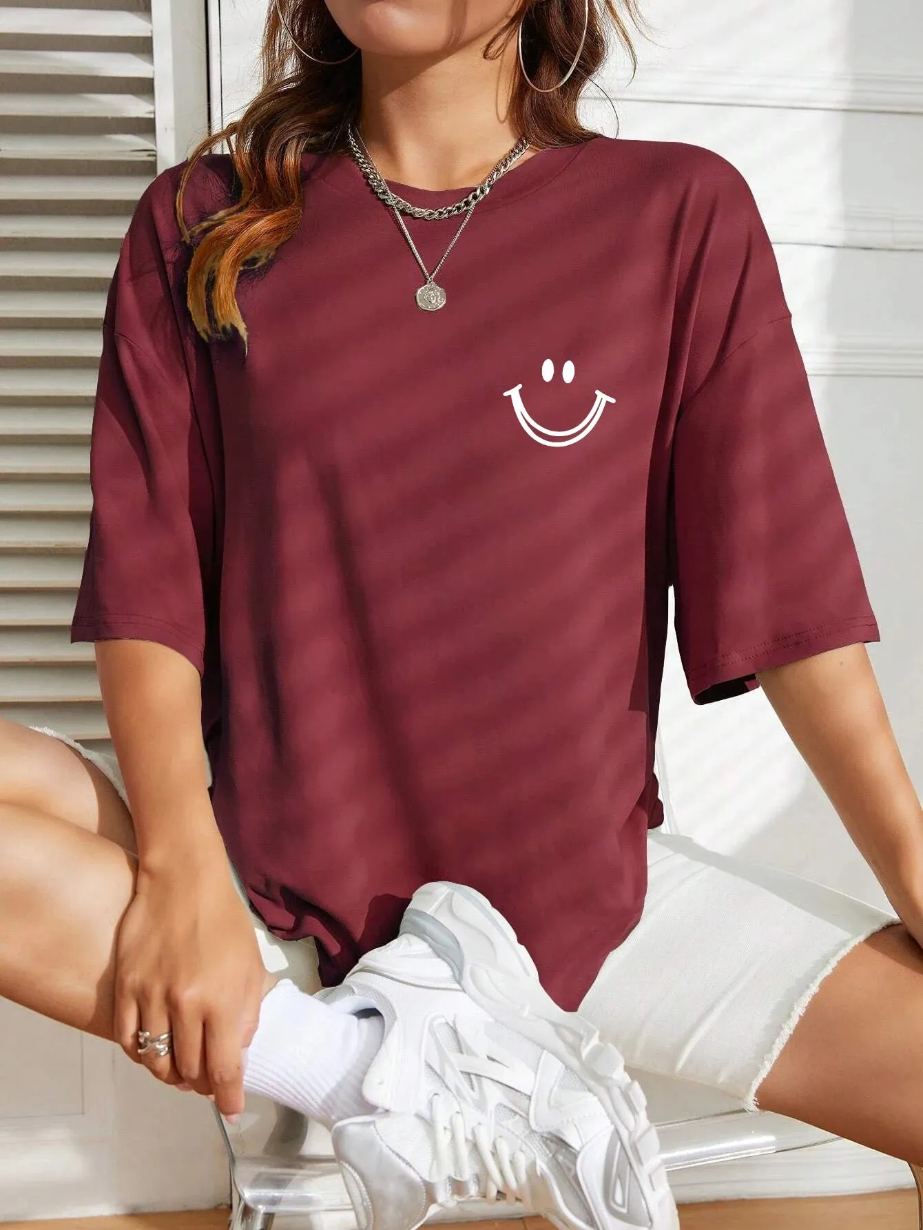 Smiley face oversized cotton graphic tee for the ladies