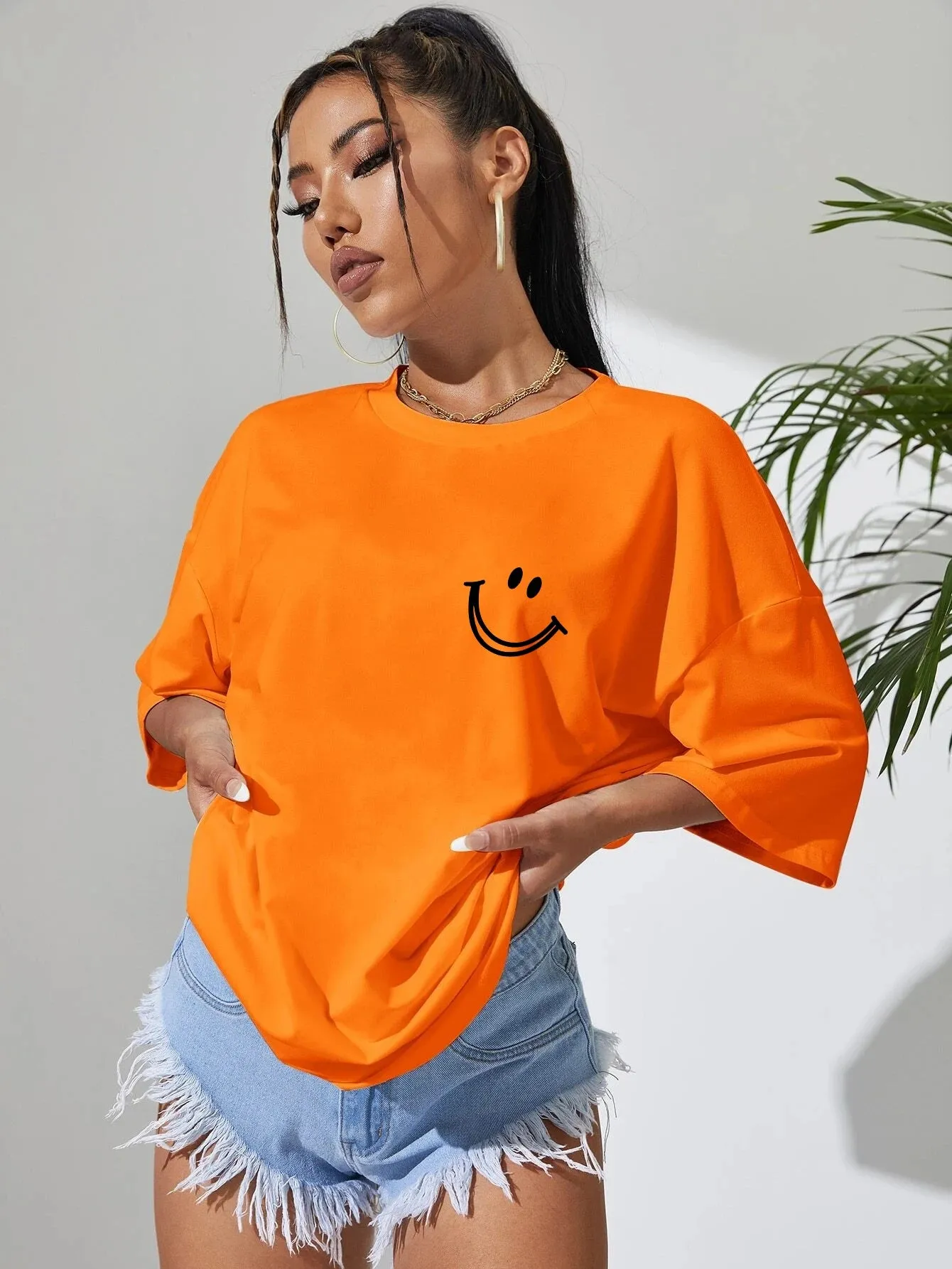 Smiley face oversized cotton graphic tee for the ladies