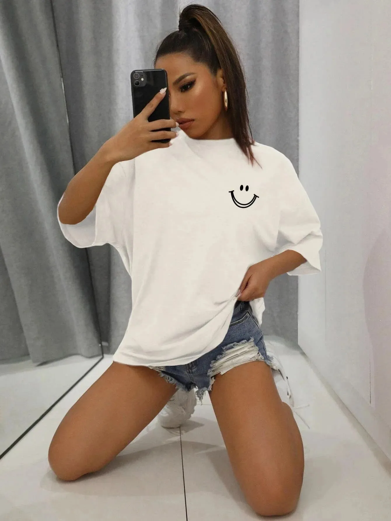 Smiley face oversized cotton graphic tee for the ladies
