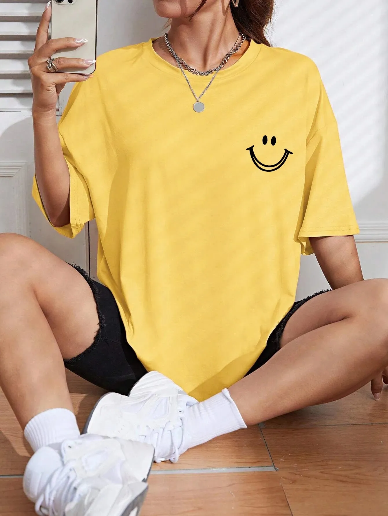Smiley face oversized cotton graphic tee for the ladies