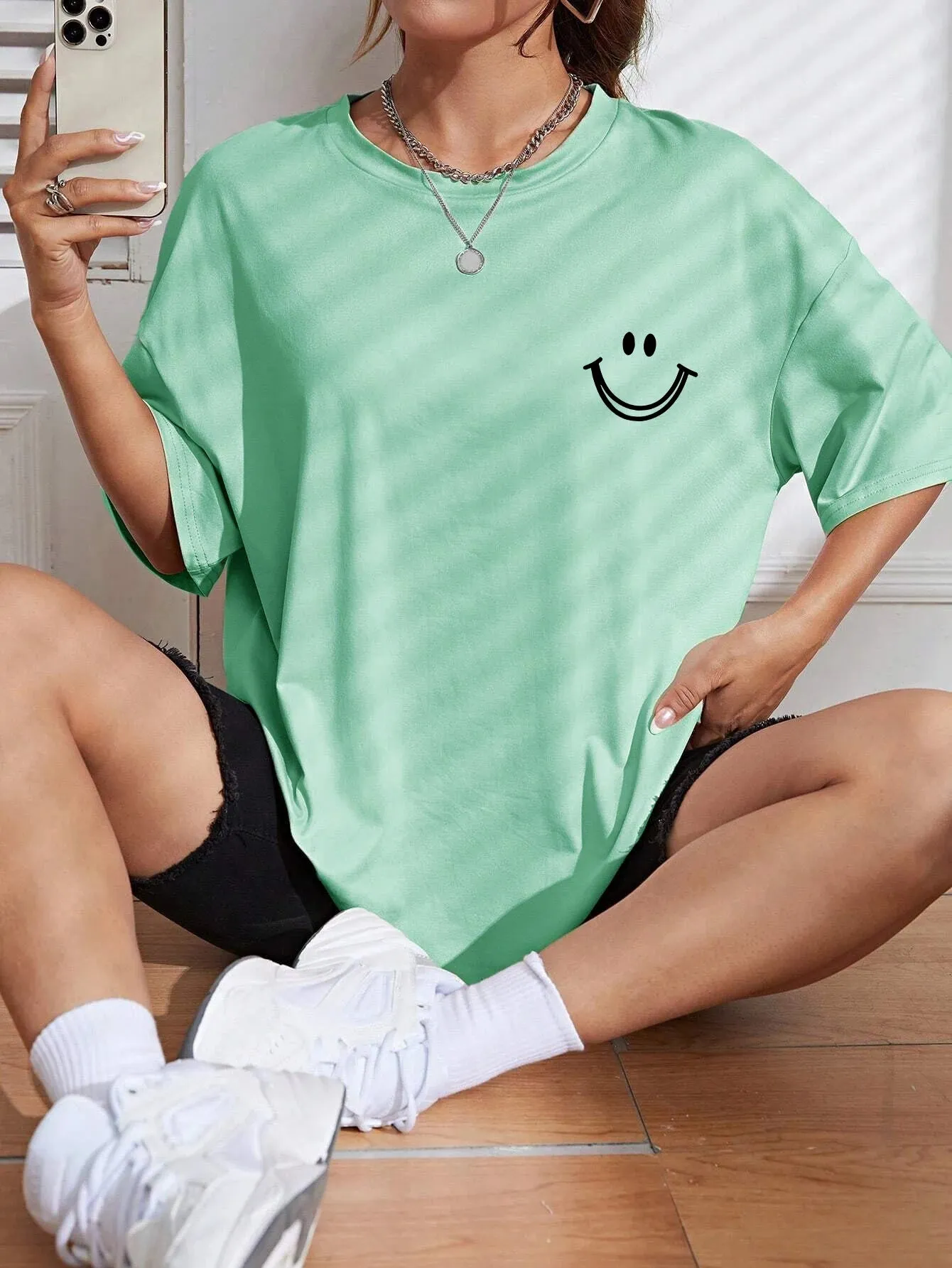 Smiley face oversized cotton graphic tee for the ladies