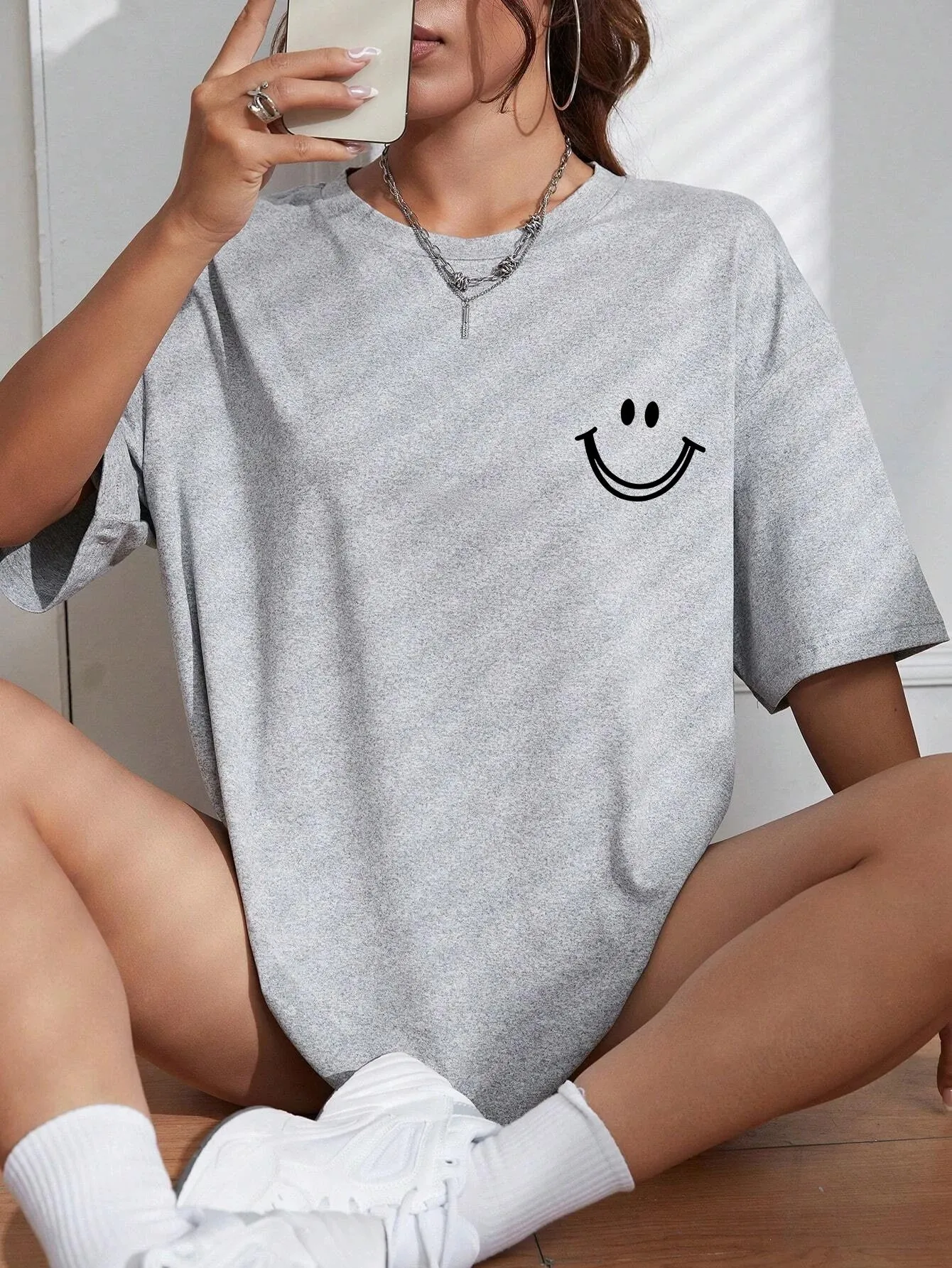 Smiley face oversized cotton graphic tee for the ladies